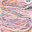 Handspun yarn with pastel colors on a white background, labeled 'Handspun in Northern Ireland'.