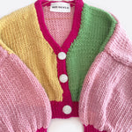 Pink, green, yellow and rose coloured cardigan with rhinestone buttons